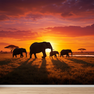 Elephant Family Silhouette Nature Wallpaper Mural. A silhouette of an elephant herd walking across a savanna at sunset.
