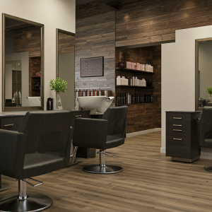 ergonomically-designed chairs and backwash units to minimize physical strain on stylists.