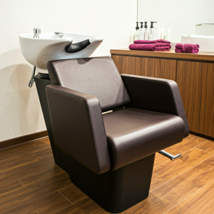 Comfortable shampoo chairs with adjustable features, and high-quality shampoo bowls with ergonomic design enhance the beauty parlour experience.