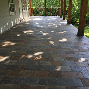 Covering a concrete floor with clinker tiles - dried, fired refractory clay.