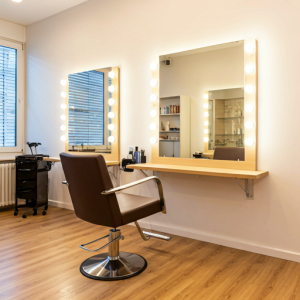 Functional and stylish styling station with ergonomic styling chair with adjustable height client comfort and stylist ease of use. Large mirrors with excellent lighting, including daylight bulbs.