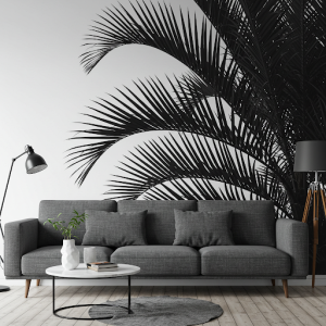 The silhouette of black and white palm leaves wallpaper mural embraces simplicity and clean lines, focusing on the essential form of the palm tree.