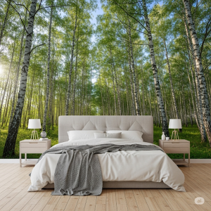 A panoramic forest scene wallpaper featuring a peaceful birch grove visually expands the bedroom. 