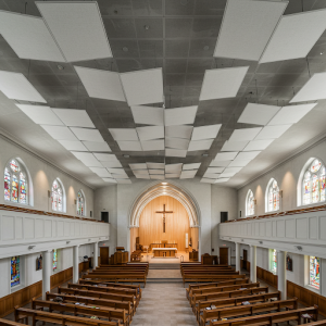 Acoustic Ceiling Baffles absorb sound in the upper areas of the church, preventing sound waves from bouncing off the ceiling. 