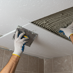 Bathroom remodel celling pasting with lightweight polystyrene foam boards.