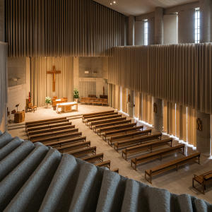 Church with sound absorbing window curtains.
