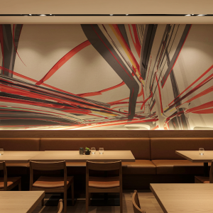 Abstract graphics wallpaper in a restaurant can create a bold and contemporary statement.