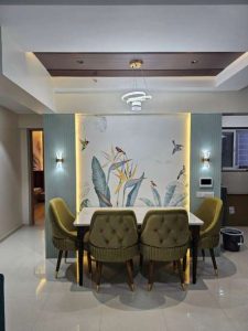 Birds of Paradise plant in bloom with large green and teal leaves eco-friendly wallpaper mural. 