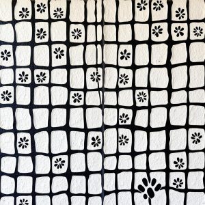 Black-and-white Kassena plaster mural with netting and animal tracks